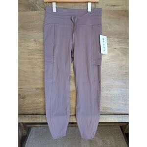 Athleta Rainier Cargo Tight Leggings Womens M Purple High Waisted Drawstring NWT